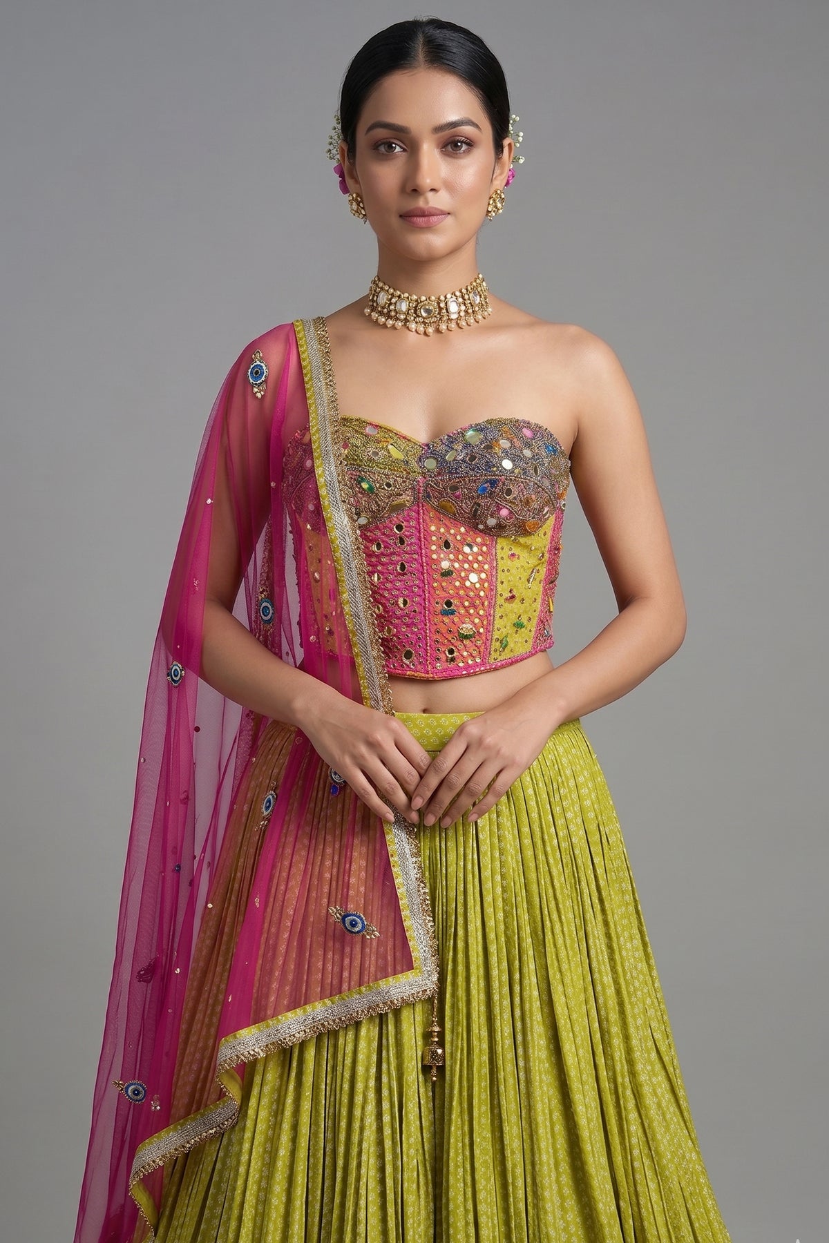 Close-up of mirror and beadwork on the Citrine Yellow Chinon Pleated Corset Lehenga Set
