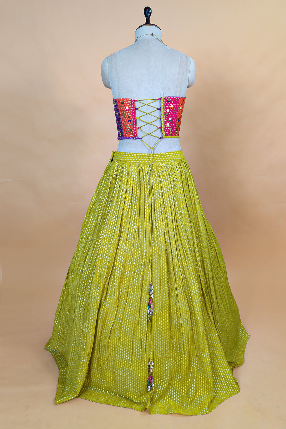 Citrine Yellow Chinon Pleated Corset Lehenga Set with a coordinated net dupatta