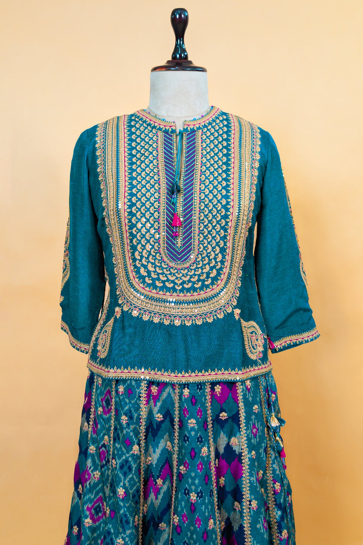 Peacock Blue Silk Sequin Embroidered Lehenga Set paired with a matching sheer dupatta