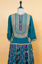 Peacock Blue Silk Sequin Embroidered Lehenga Set paired with a matching sheer dupatta