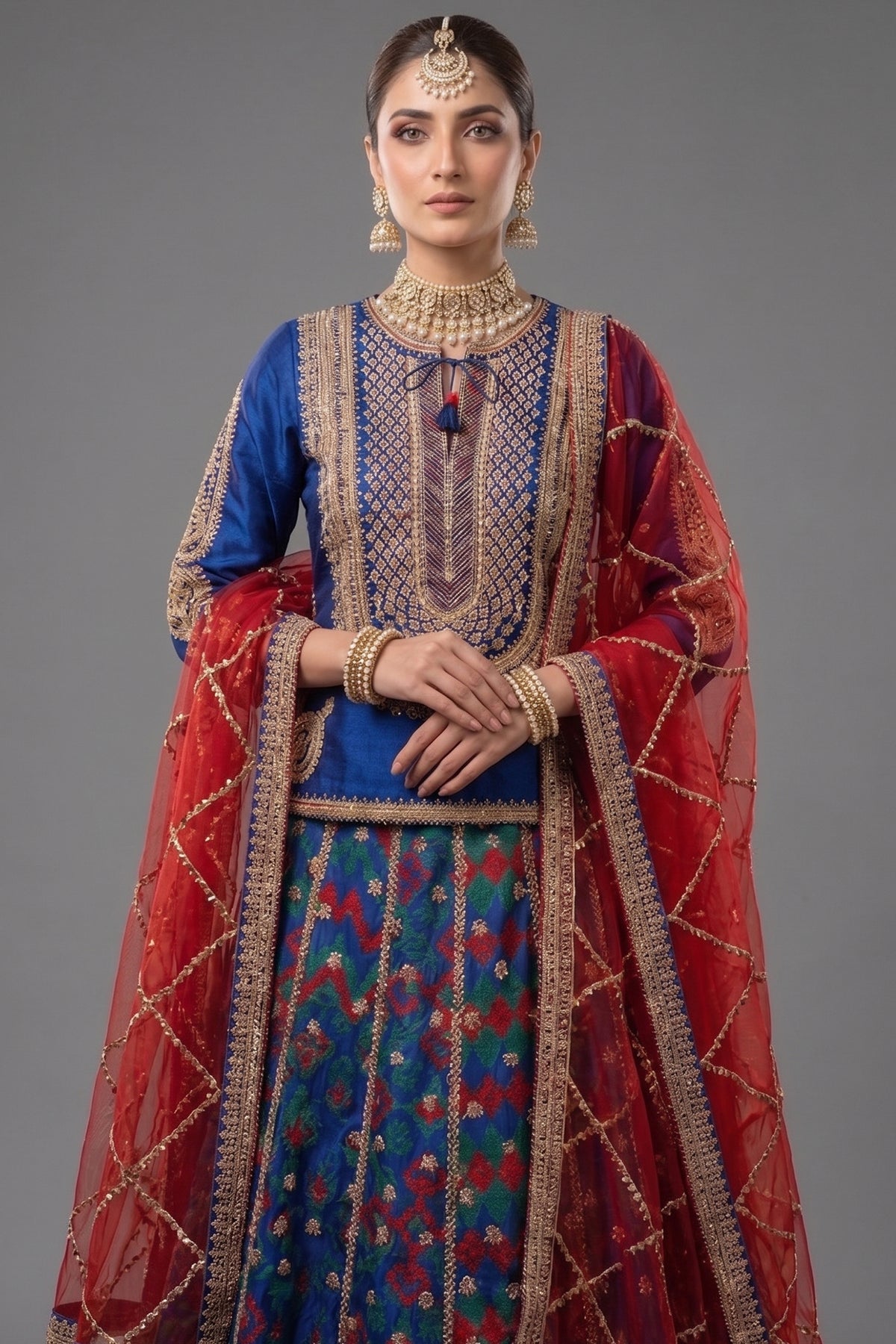 Close-up of golden thread-work and sequins on the Blue Silk Sequin Embroidered Lehenga Set