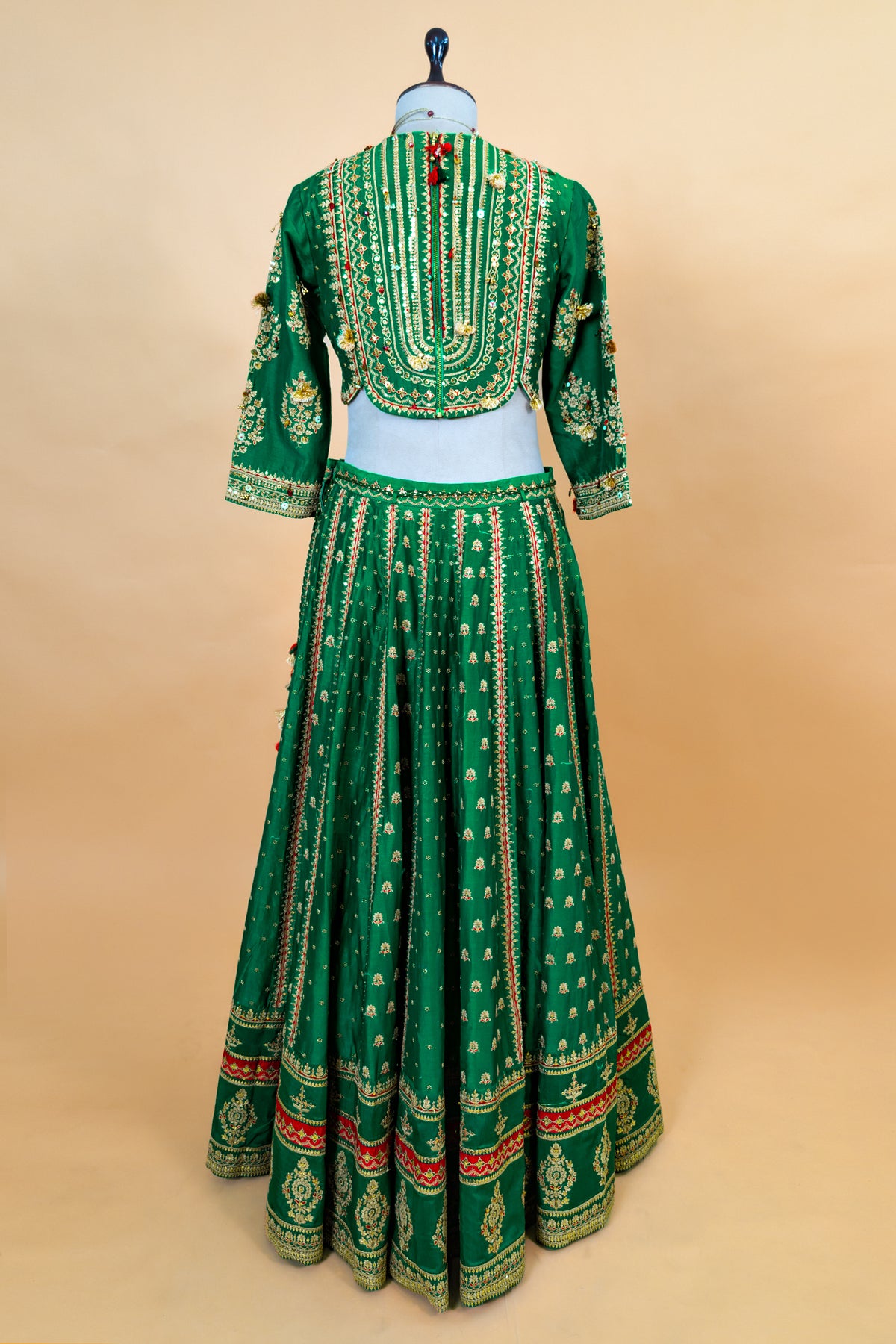 Dark Green Silk Sequin Embroidered Lehenga Set with golden metallic thread and bead details