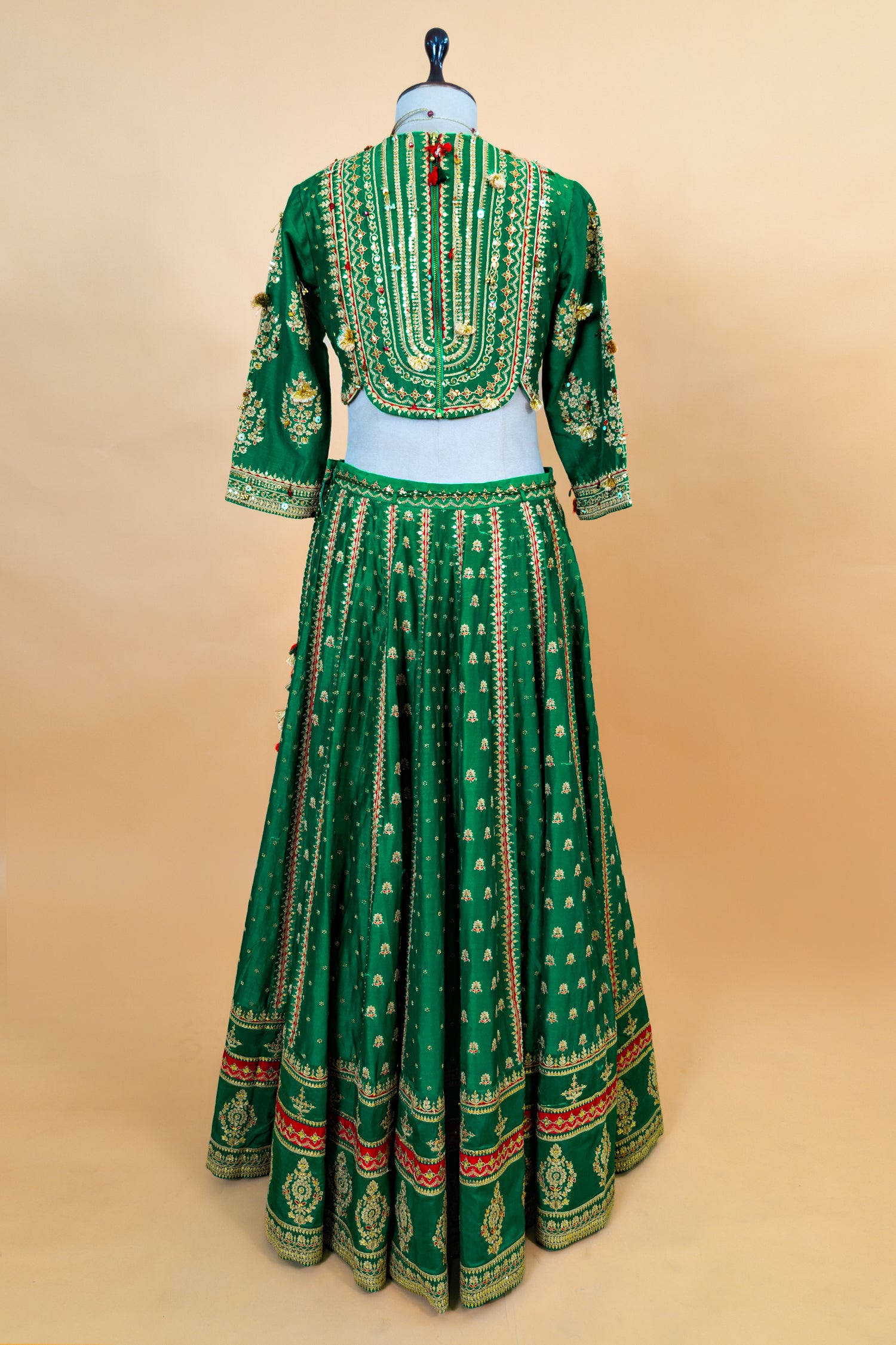 Dark Green Silk Sequin Embroidered Lehenga Set with golden metallic thread and bead details