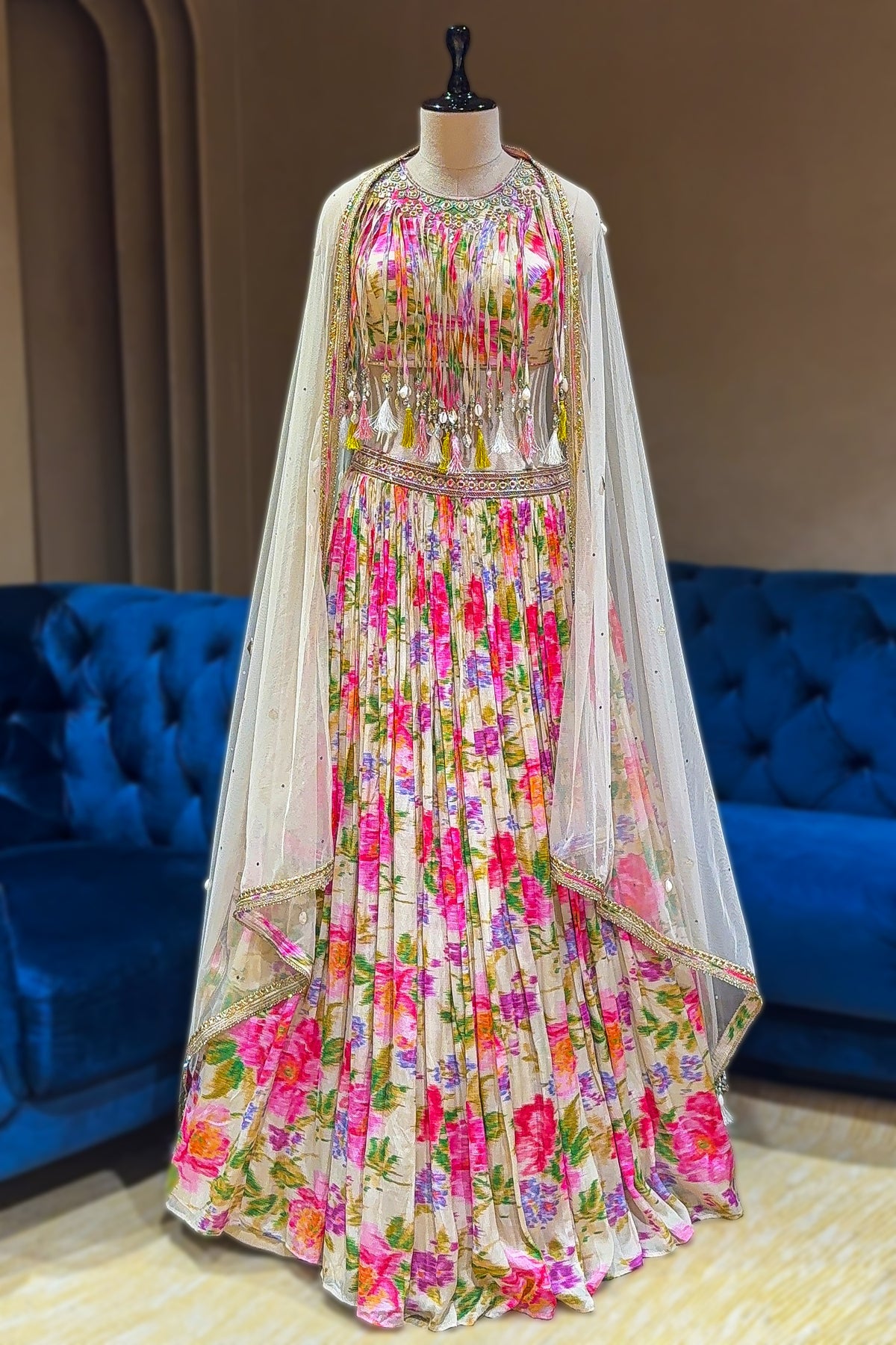 Vibrant floral digital print details on the skirt of the Ivory White Chinon Lehenga