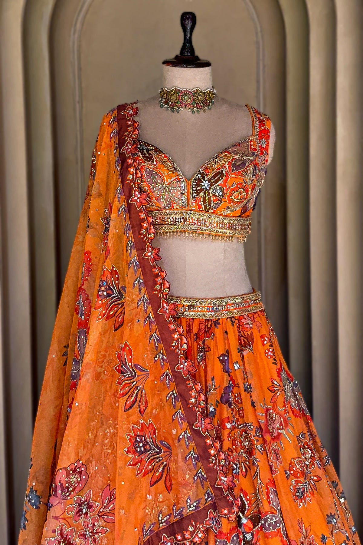 Botanical digital print details and embellished waistband of Orange Organza Lehenga Set