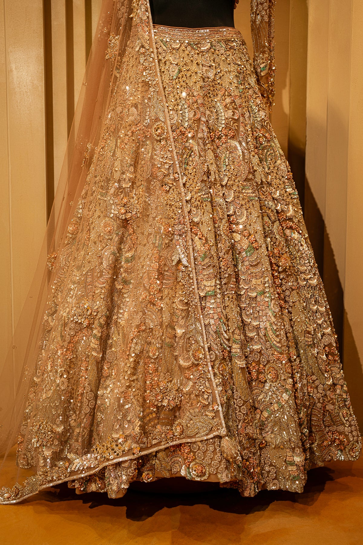 Champagne Beige Net Lehenga with scalloped choli and net dupatta