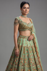 Close-up of shimmering sequins and cutdana on the Green Organza Designer Handworked Lehenga