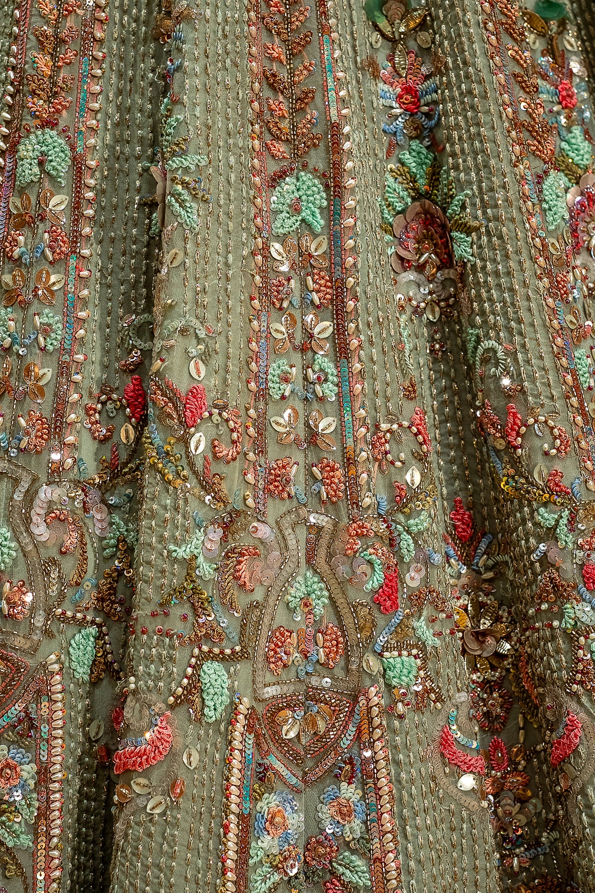 Voluminous flare and intricate beadwork of the Green Organza Designer Handworked Lehenga