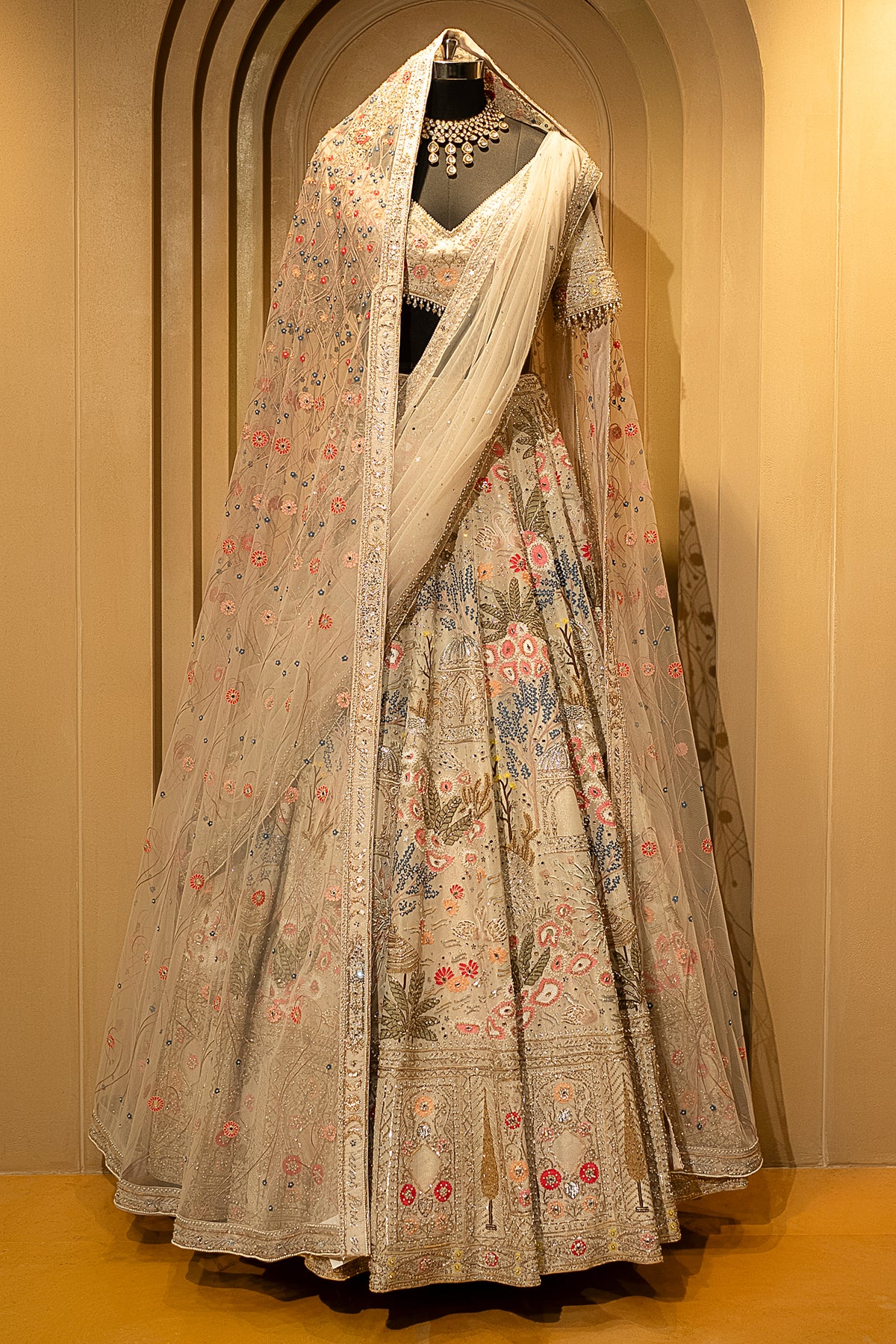 Close-up of handworked shimmer details on the Ivory White Organza Lehenga