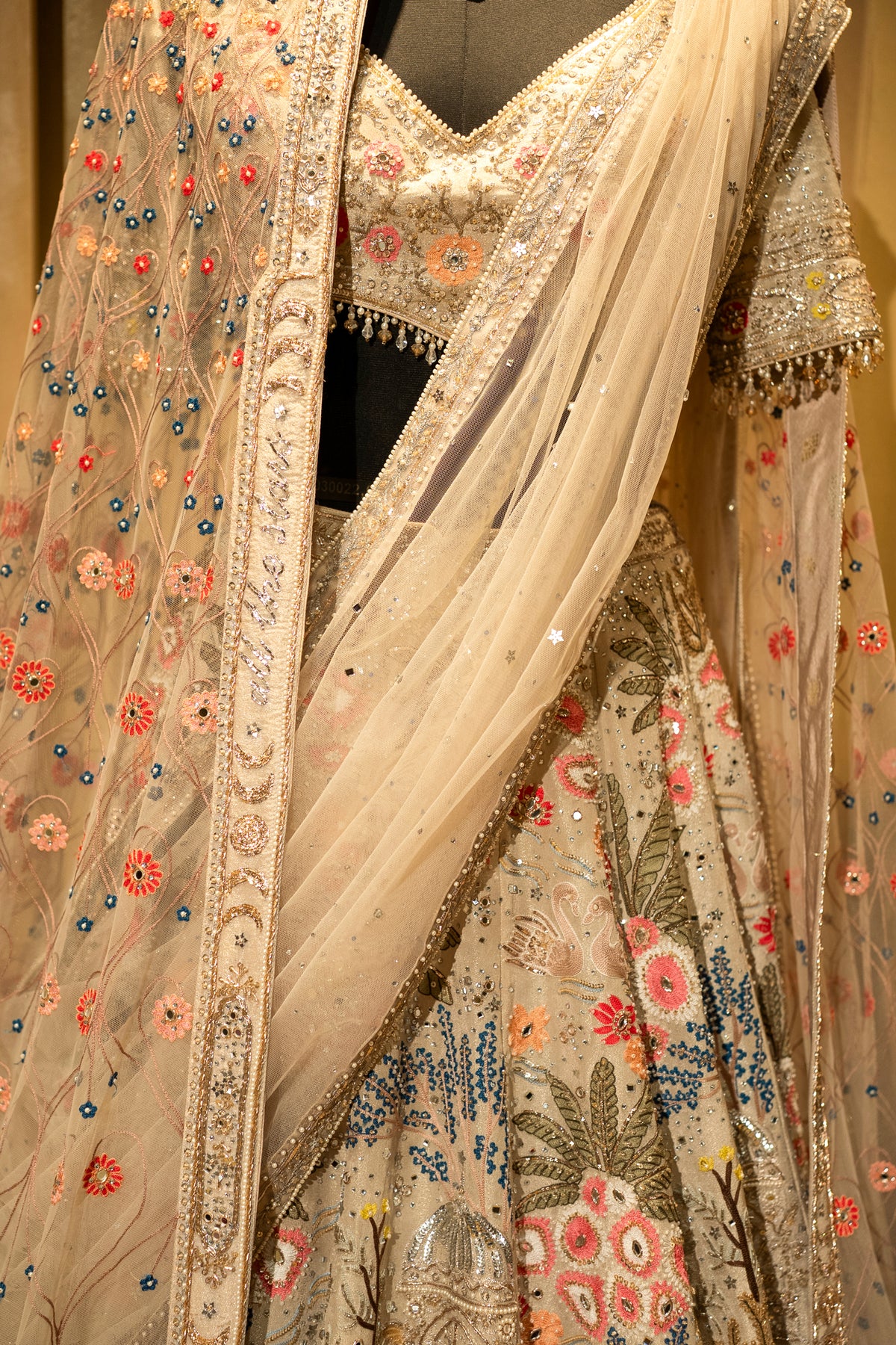 Designer Ivory White Organza Lehenga with swan motifs and garden theme