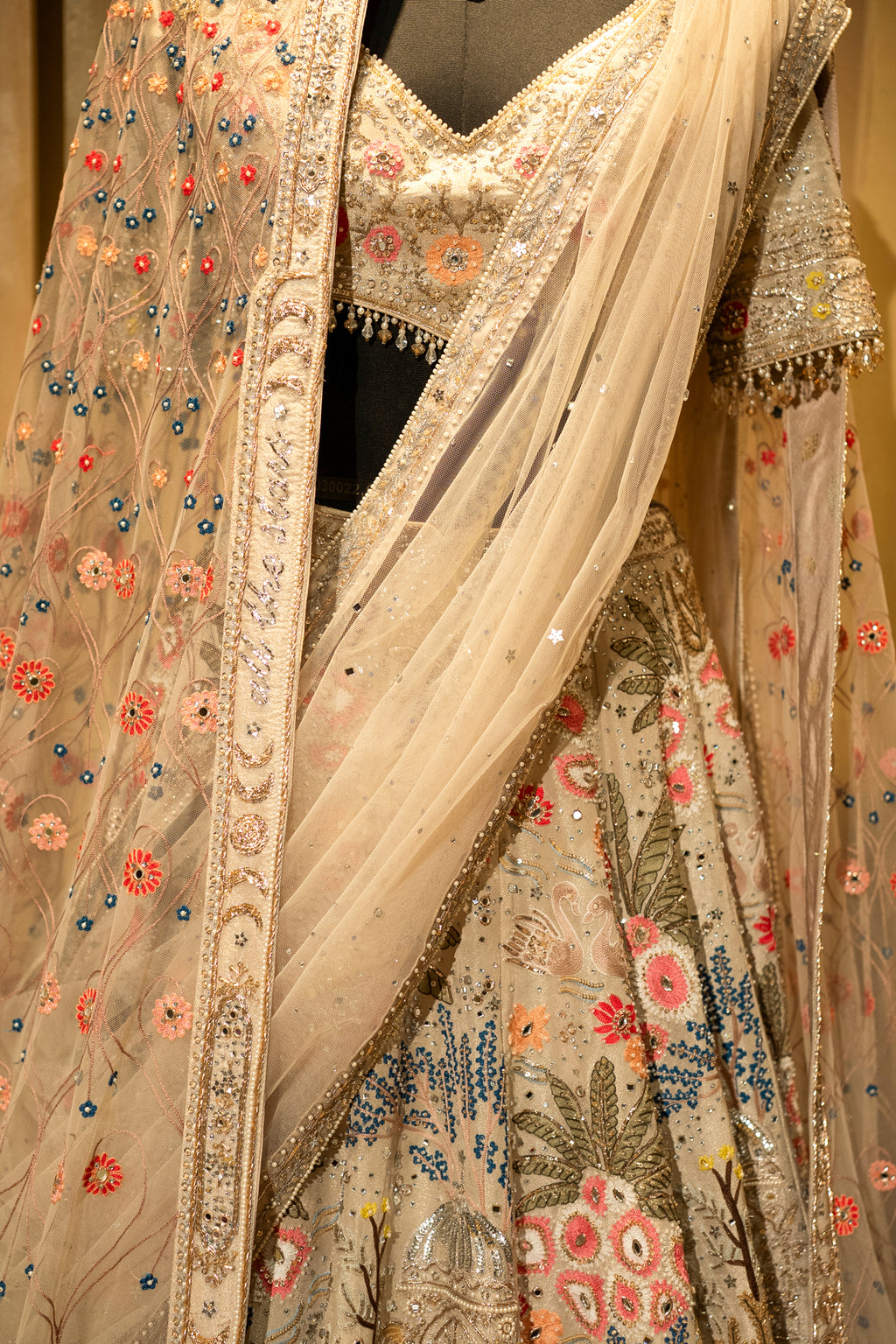 Designer Ivory White Organza Lehenga with swan motifs and garden theme