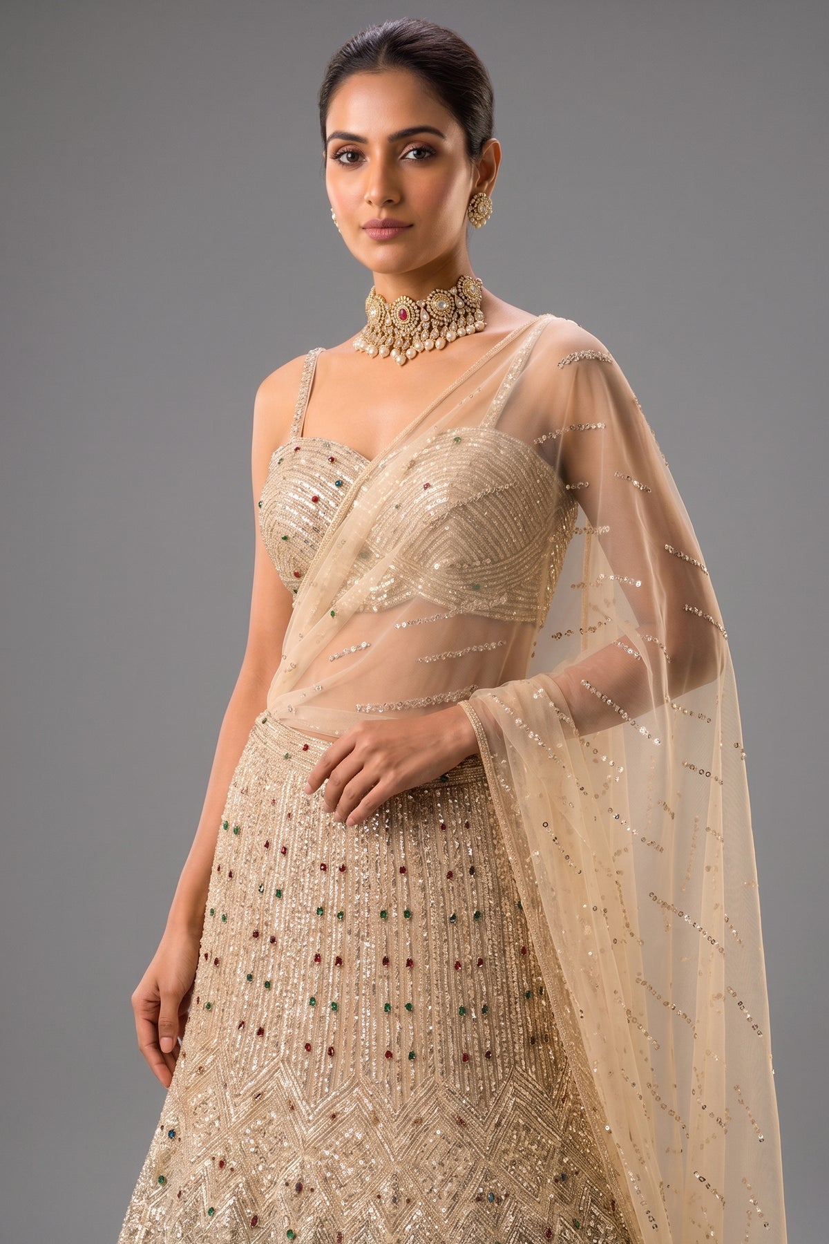 Close-up of intricate cutdana work on the Champagne Gold Net Mermaid Lehenga
