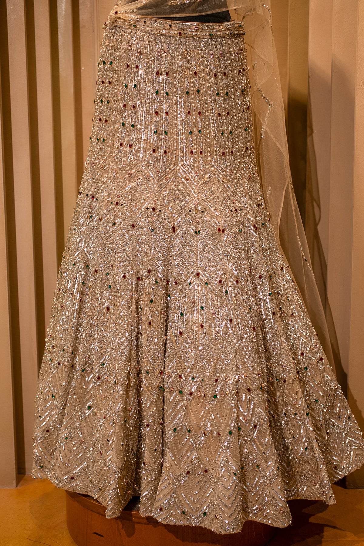 Champagne Gold Net Mermaid Lehenga with Attached Cape-Style Dupatta & Intricate Cutdana Work - gold net saree