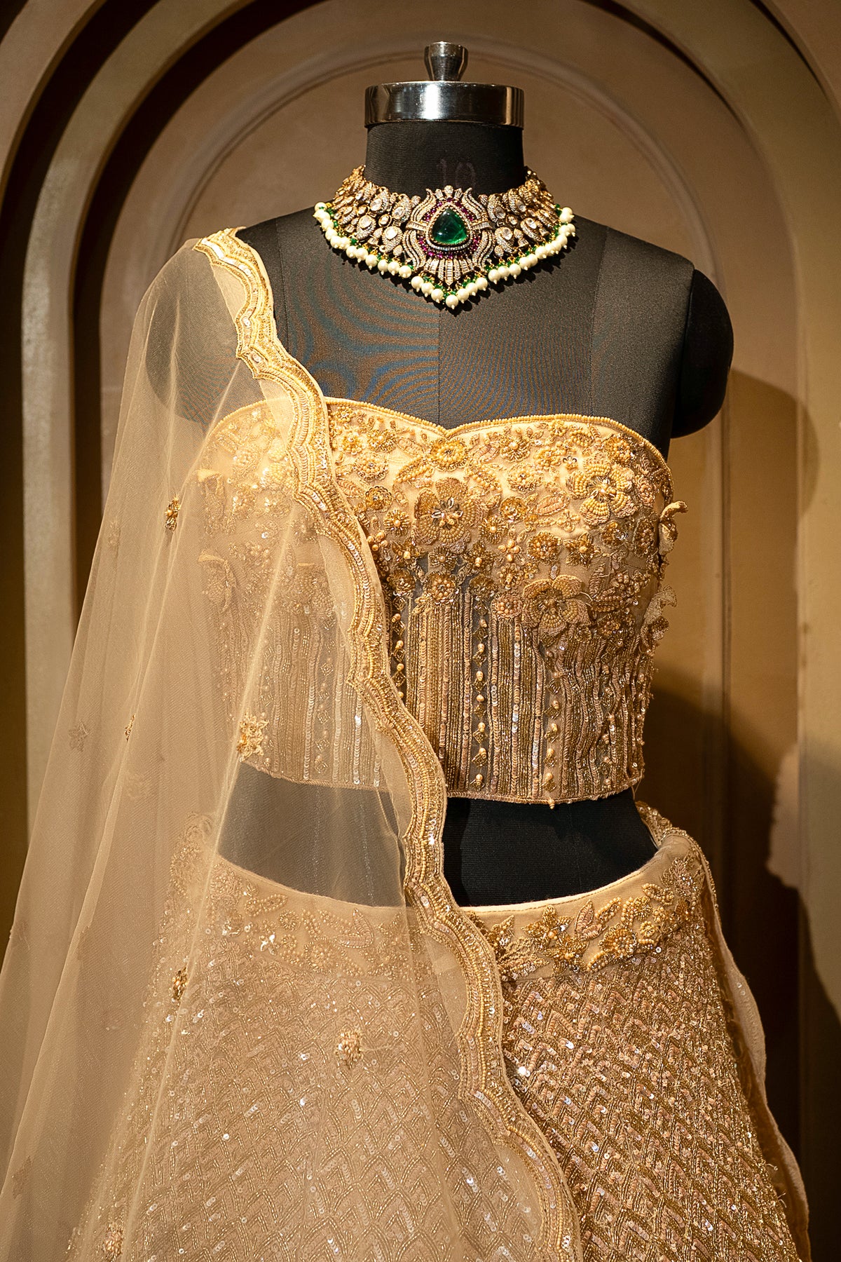 Designer Champagne Gold Net Corset Lehenga for modern brides