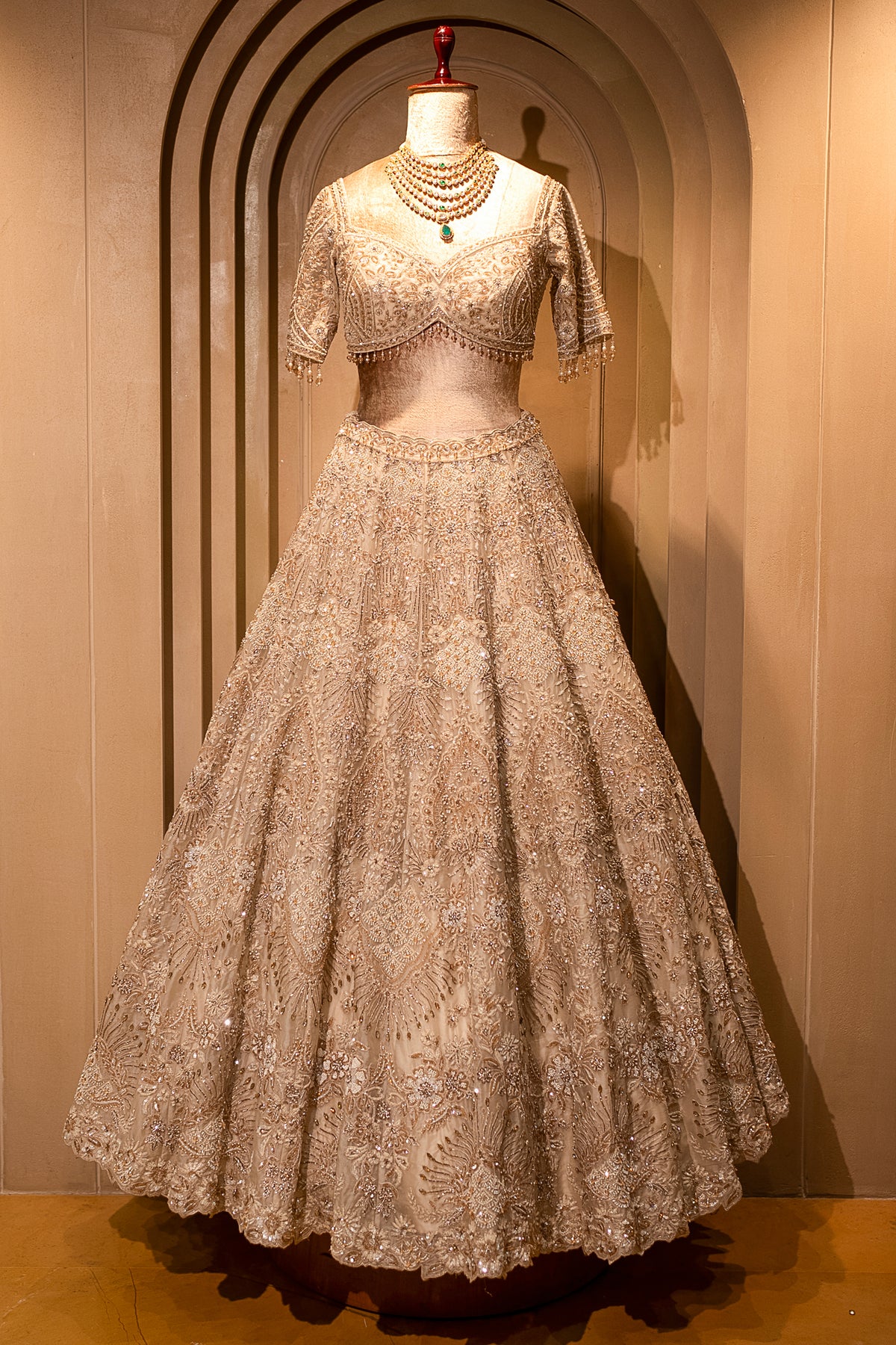 Ivory White Silk Bridal Lehenga with intricately embroidered blouse