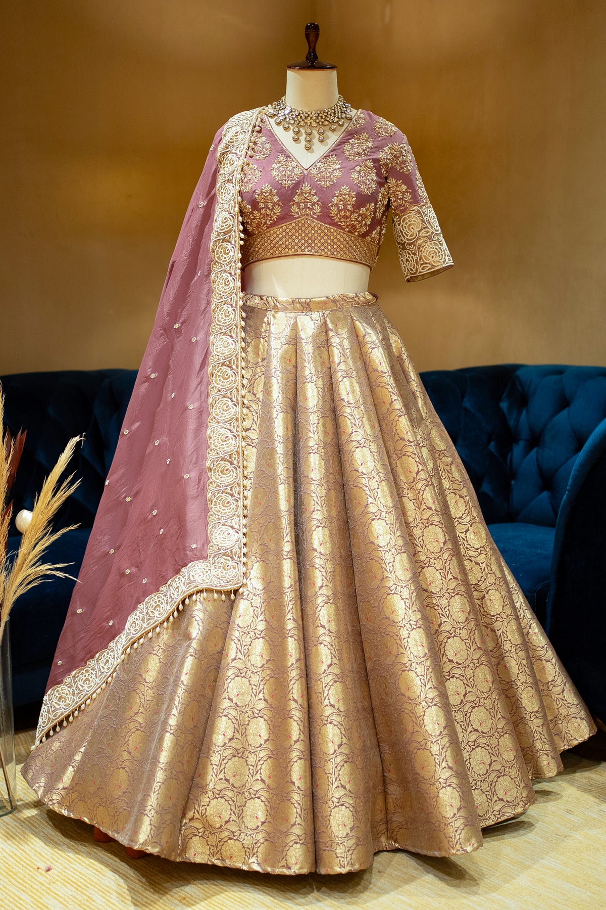 Close-up of floral jaal weaving on the Onion Pink Banarasi Bridal Lehenga