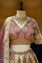 Hand-embellished blouse details on the Onion Pink Banarasi Bridal Lehenga
