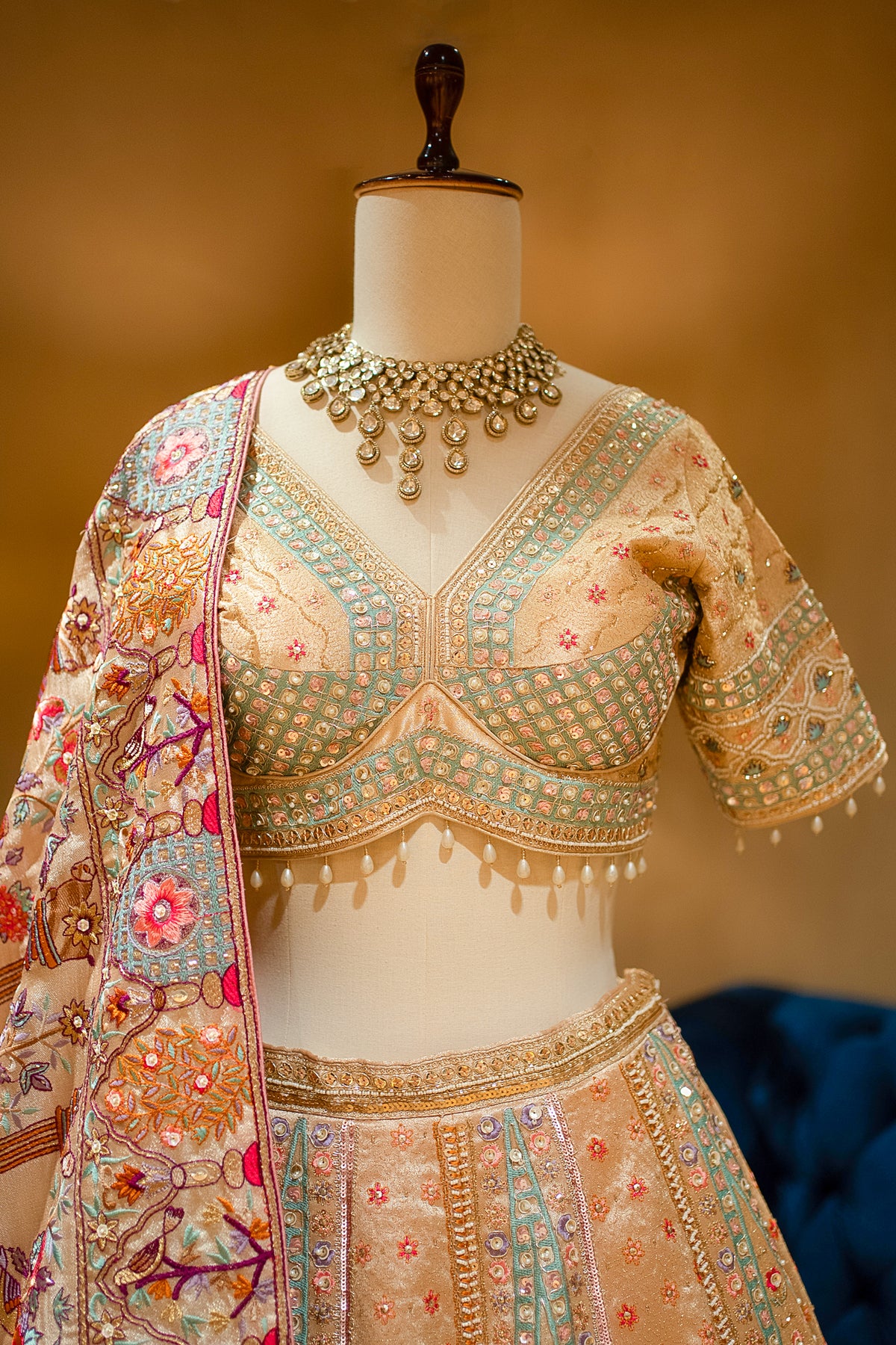 Architectural cutdana details on the Gilded Floral Tissue Silk Lehenga