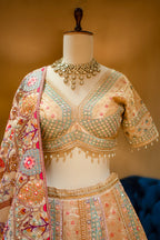 Architectural cutdana details on the Gilded Floral Tissue Silk Lehenga
