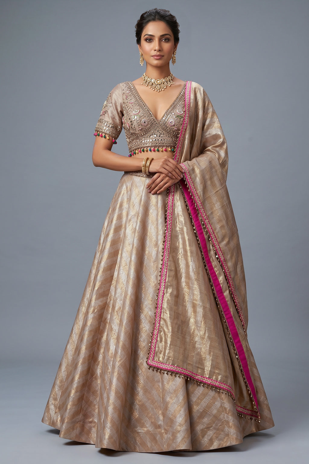 Golden Tissue Silk Lehenga with Kundan jewelry style embroidered blouse front view