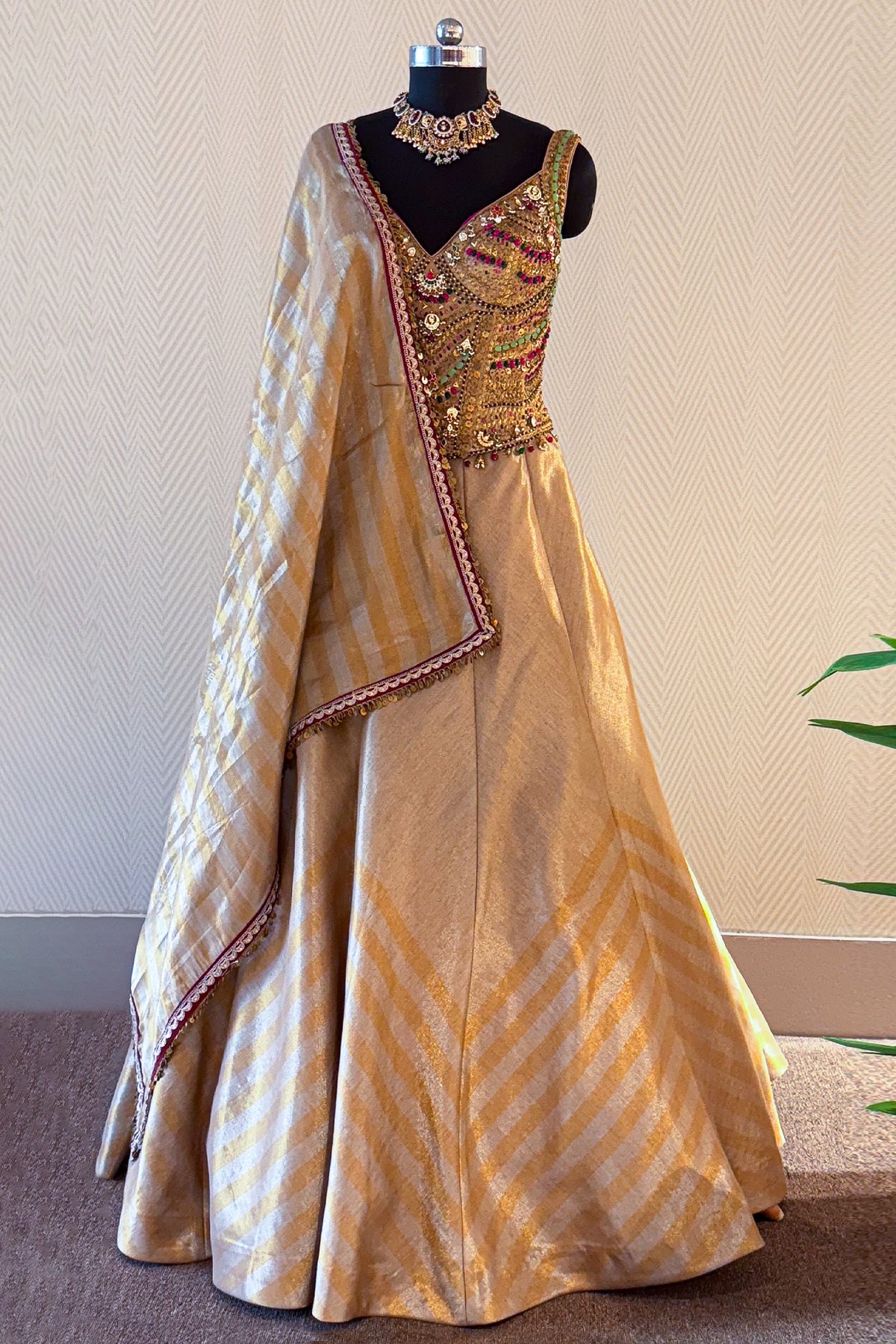 Golden Tissue Silk Lehenga back view showcasing the structured corset silhouette