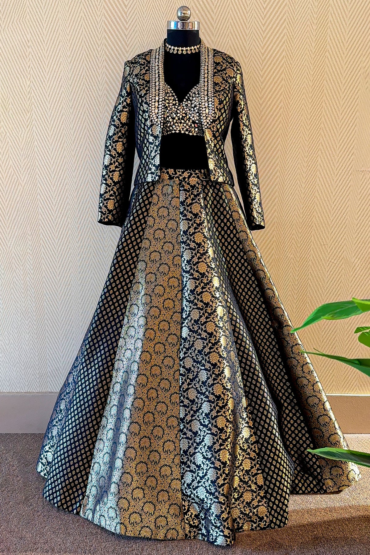 Intricately embroidered jacket details of the Black Banarasi Brocade Lehenga