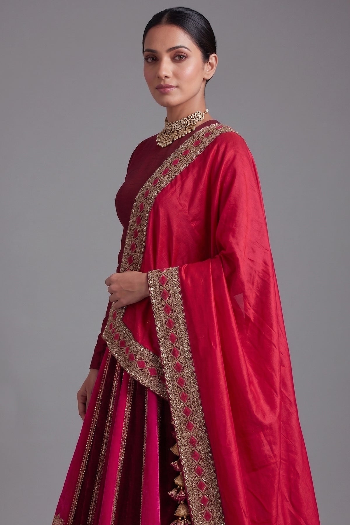 Close-up of Zardosi embroidery on the Maroon Matka Silk Bridal Lehenga