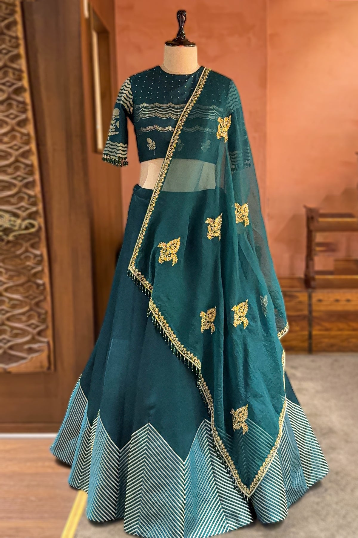 Bottle Green Silk Chevron Woven Kalidaar Lehenga with Pearl-Embellished Boat Neck Blouse