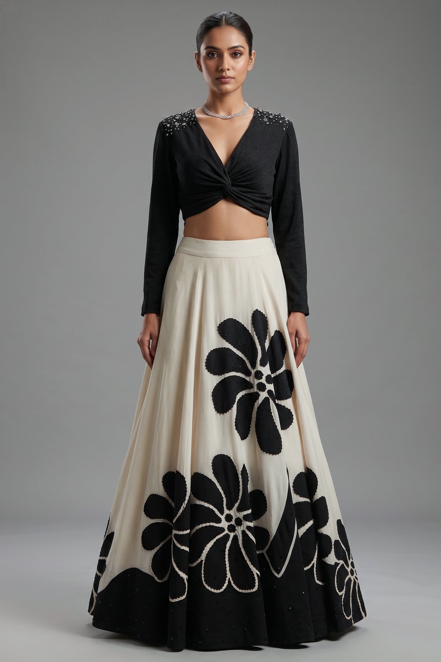 Cream Crepe Silk Bold Monochrome Floral Lehenga with Twist-Knot Gunmetal Studded Crop Top Main image