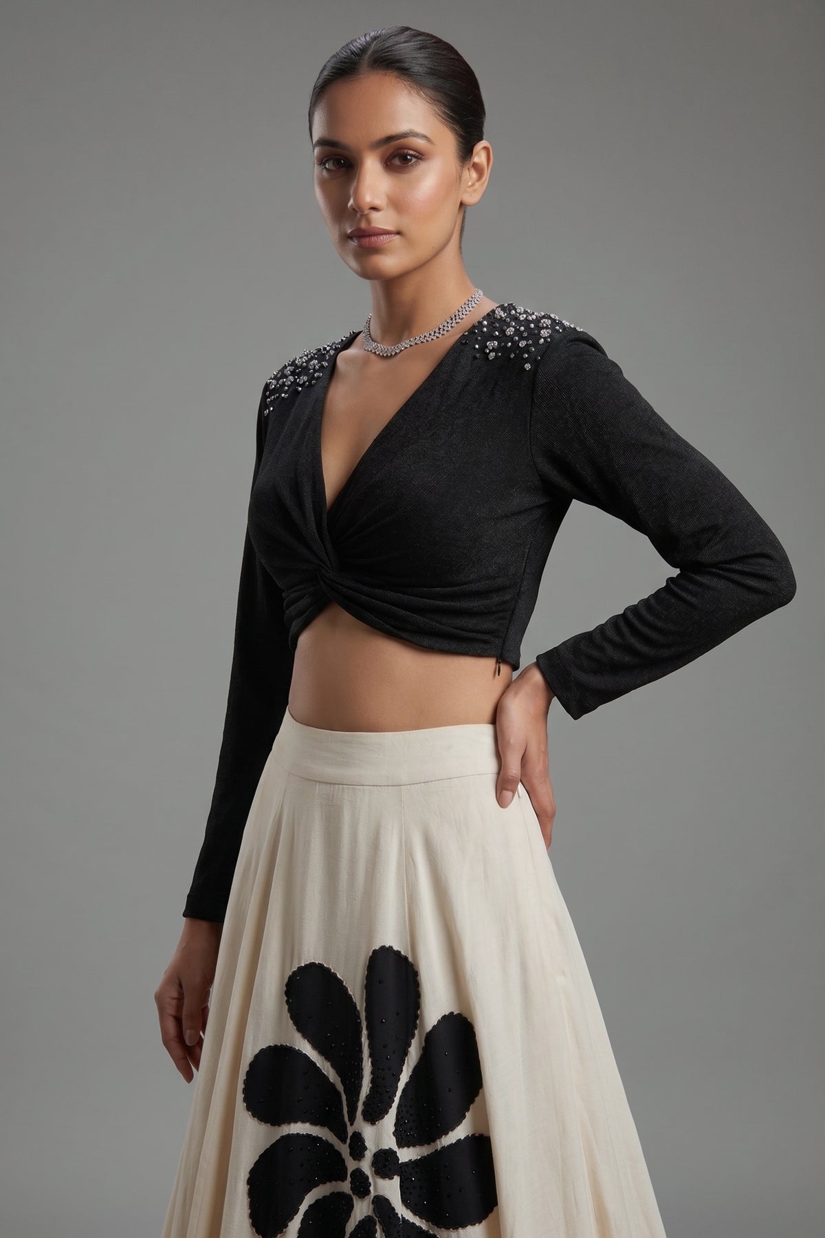 Cream Crepe Silk Bold Monochrome Floral Lehenga with Twist-Knot Gunmetal Studded Crop Top