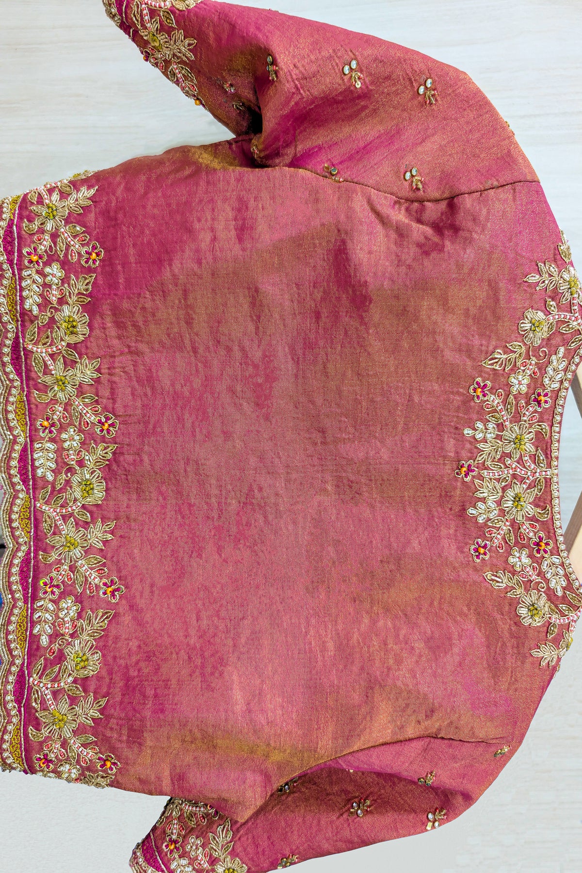 Cream and Fuchsia Two-Tone Tissue Silk Pleated Patola Ikkat Lehenga with Hand-Embellished Zardosi V-Neck Blouse