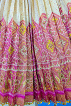 Cream and Fuchsia Two-Tone Tissue Silk Pleated Patola Ikkat Lehenga with Hand-Embellished Zardosi V-Neck Blouse