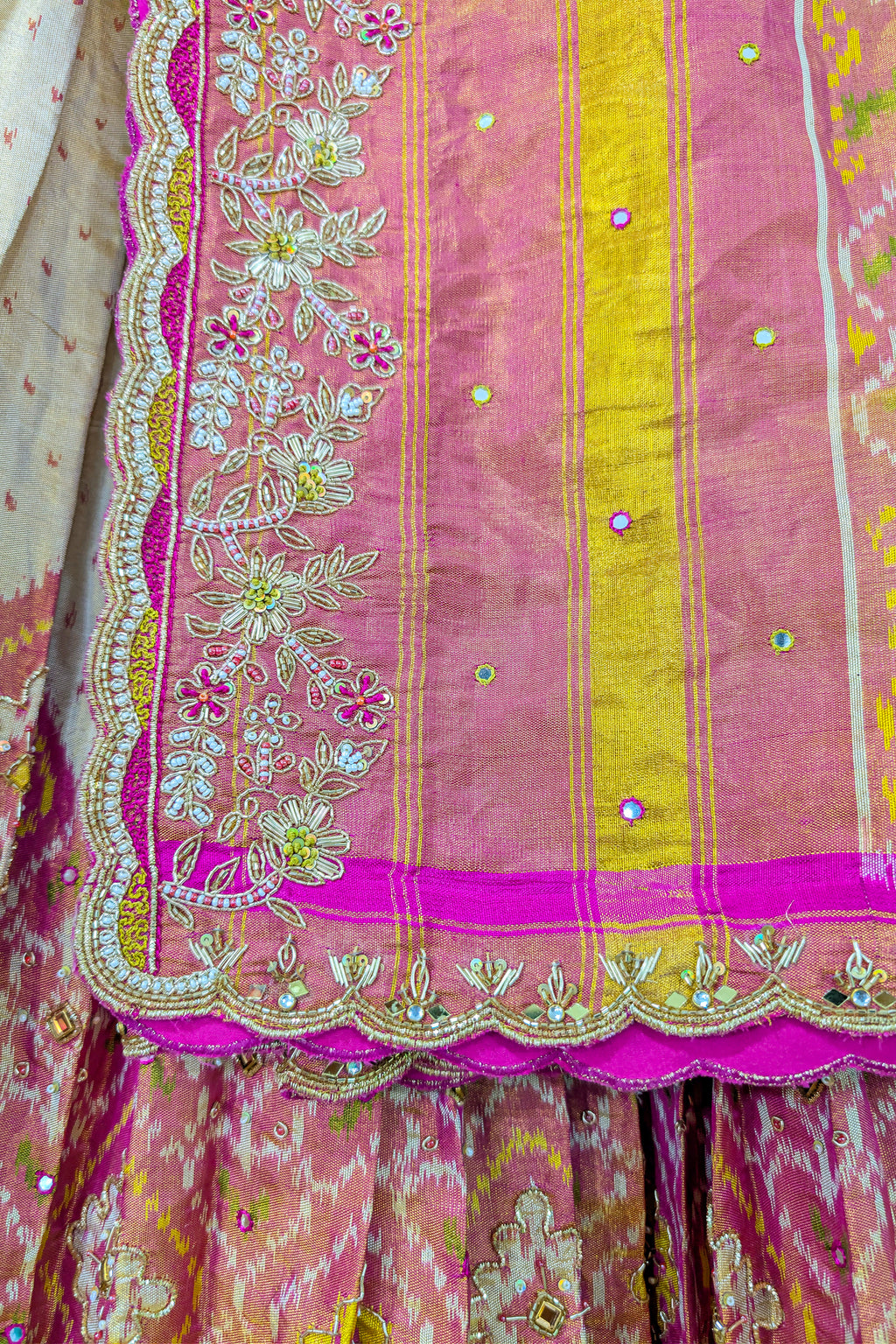 Cream and Fuchsia Two-Tone Tissue Silk Pleated Patola Ikkat Lehenga with Hand-Embellished Zardosi V-Neck Blouse