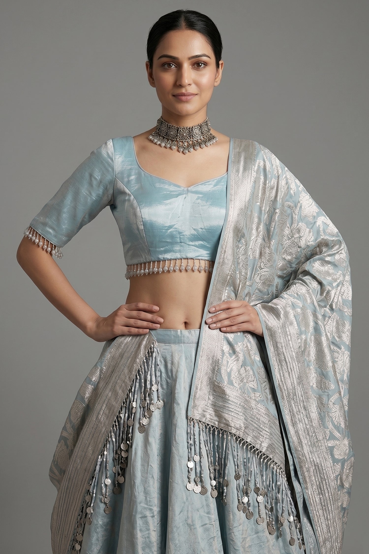 Icy Blue Metallic Tissue Silk Minimalist Lehenga Choli with Woven Banarasi Dupatta and Cowrie Shell Tassels Secondary image