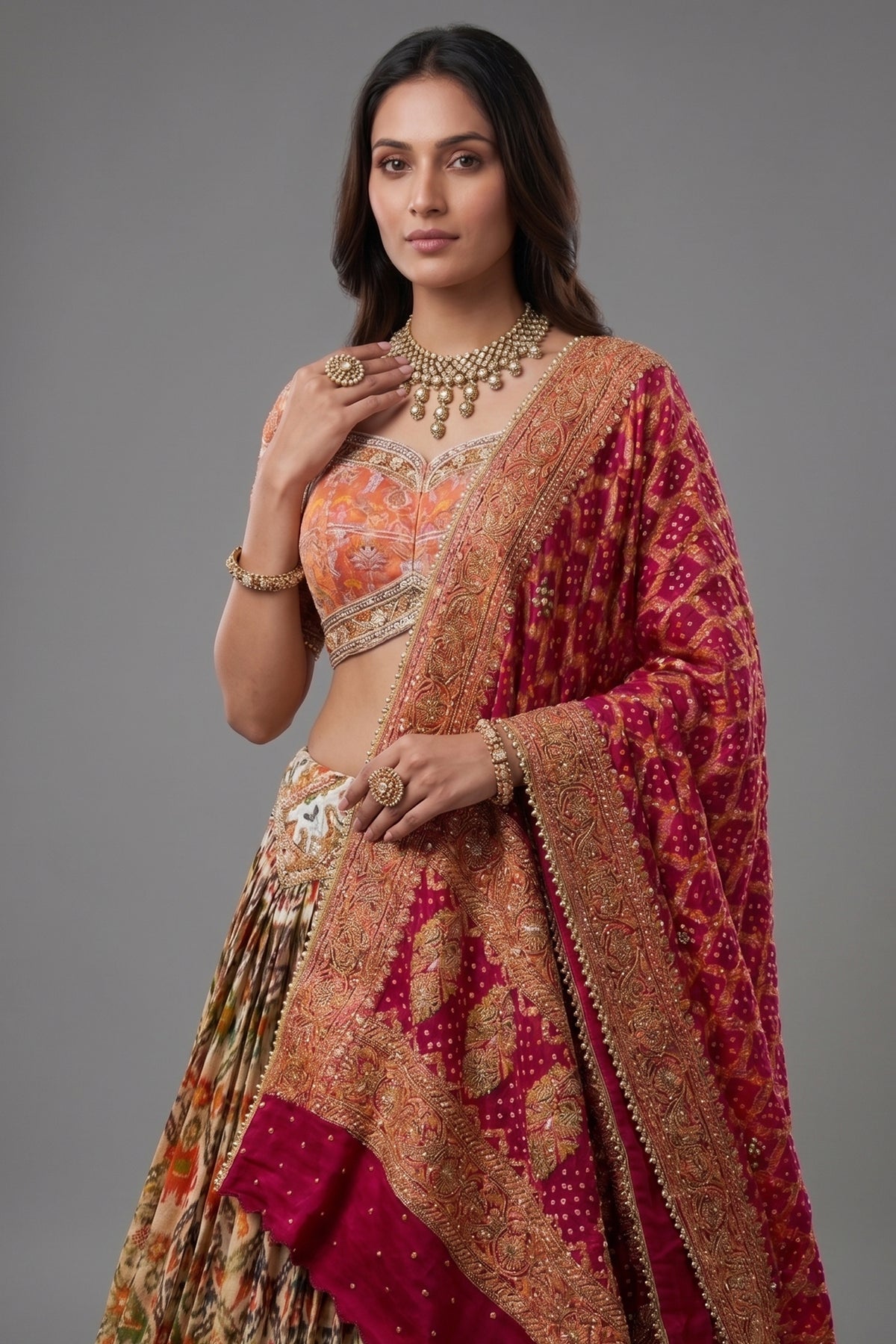 Cream and Golden Tissue Silk Heritage Patola Lehenga with Hand-Embroidered Zardosi Blouse and Georgette Bandhej Dupatta