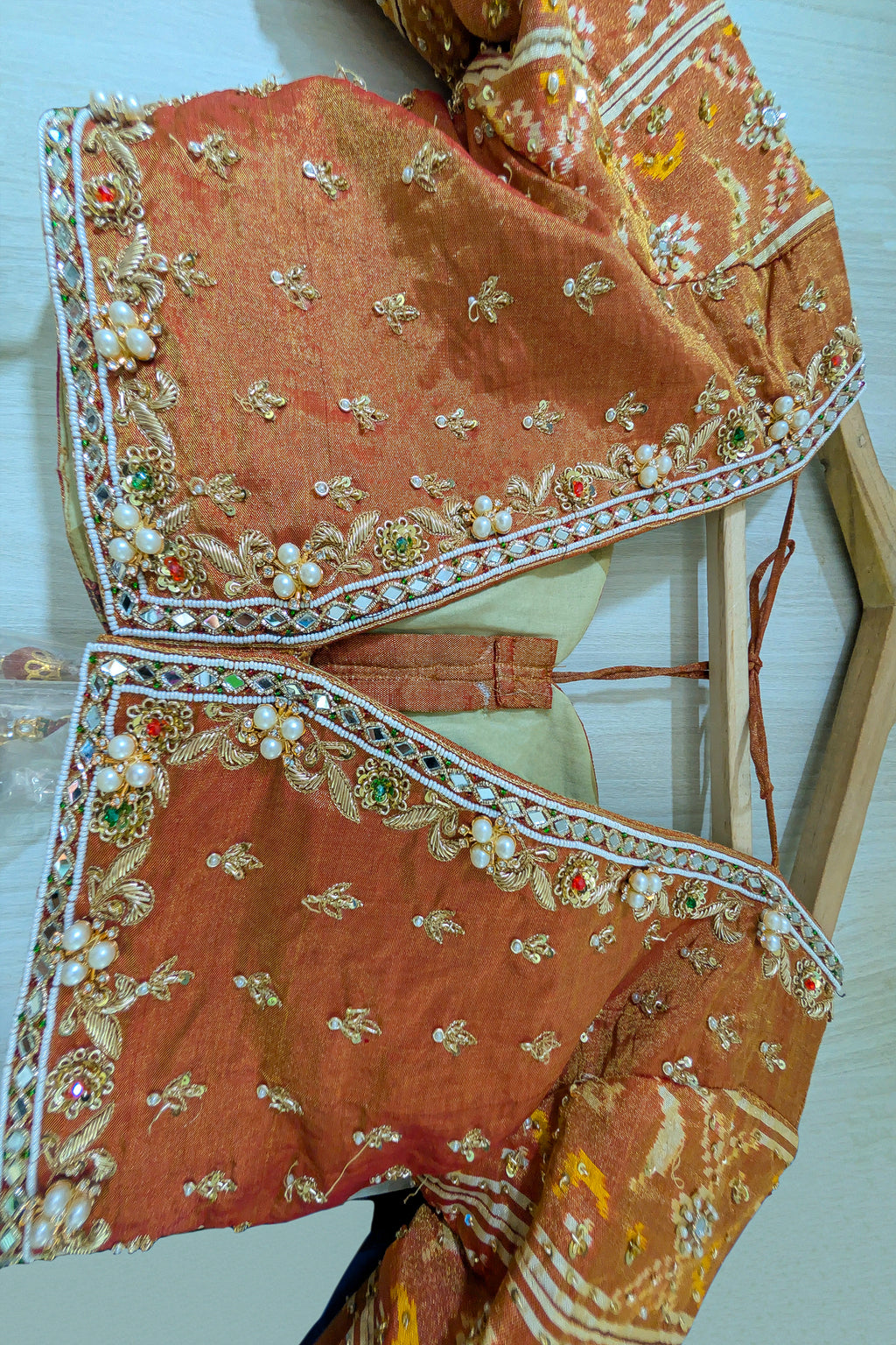 Cream and Golden Tissue Silk Heritage Patola Lehenga with Hand-Embroidered Zardosi Blouse and Georgette Bandhej Dupatta