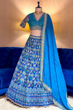 Sky Blue Silk Traditional Patola Lehenga with Hand-Embroidered Zardosi Blouse