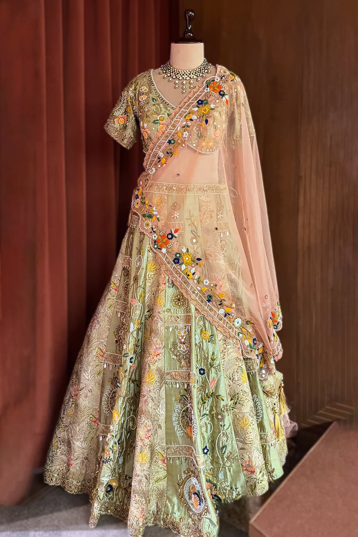 Mint Green Raw Silk Designer Lehenga with Multicolor Floral Hand-Embroidery