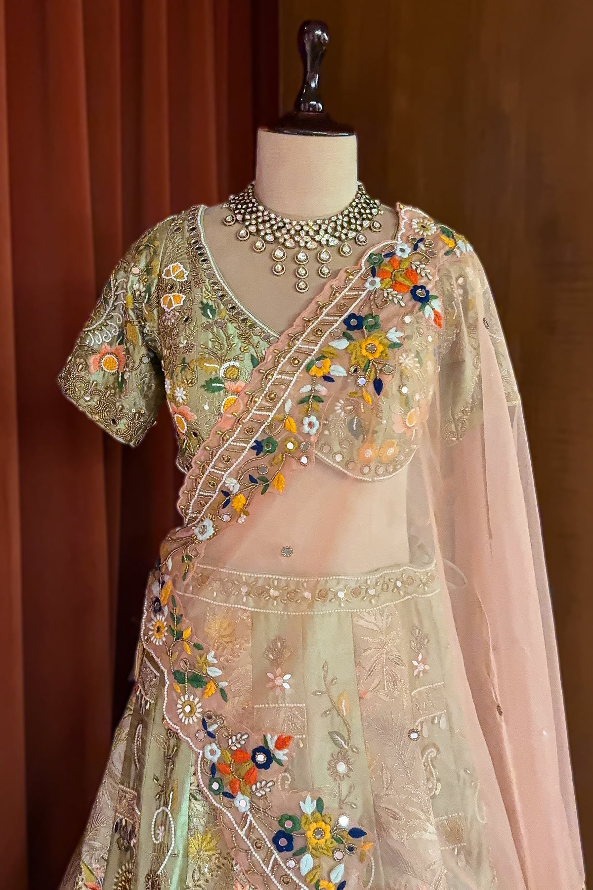 Mint Green Raw Silk Designer Lehenga with Multicolor Floral Hand-Embroidery