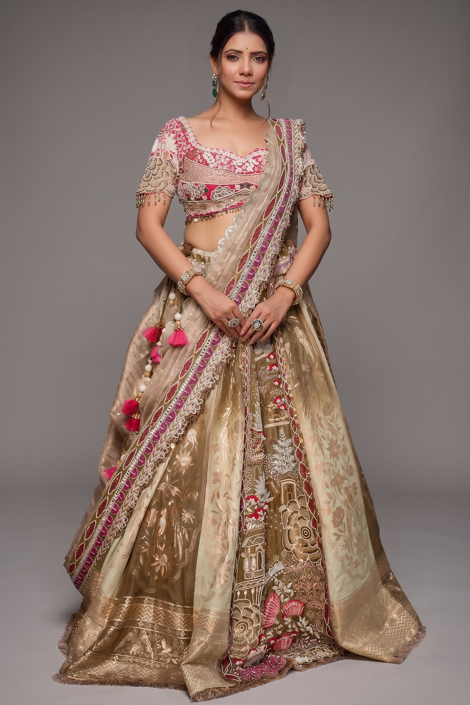 The Olive Green Shaded Brocade Silk Woven Lehenga Ensemble with Jharokha Embroidered Sweetheart Blouse and Attached Organza Dupatta Main image