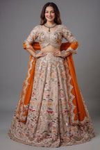 The Beige Gold Tissue Silk Kalidar Lehenga Ensemble with Hand-Embellished V-Shape Blouse and Scalloped Organza Dupatta