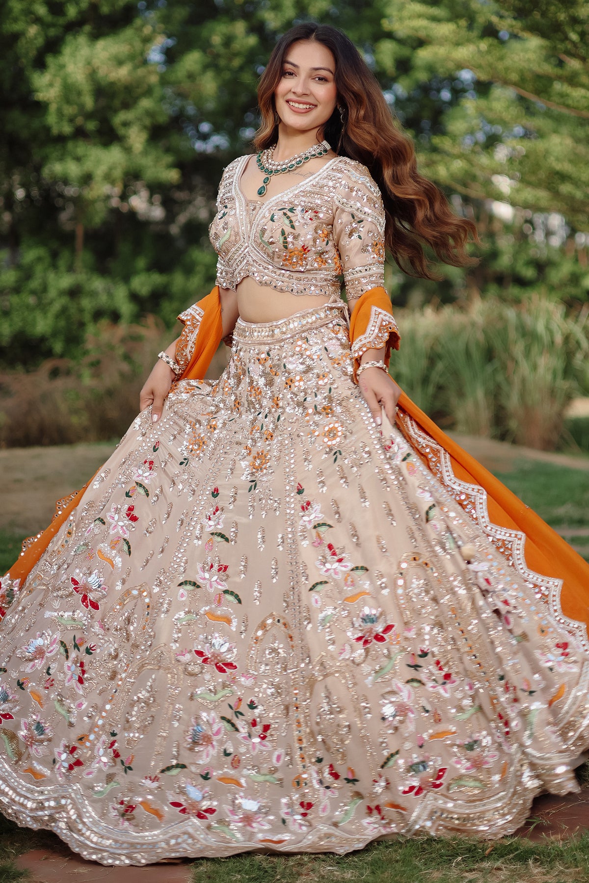 The Beige Gold Tissue Silk Kalidar Lehenga Ensemble with Hand-Embellished V-Shape Blouse and Scalloped Organza Dupatta
