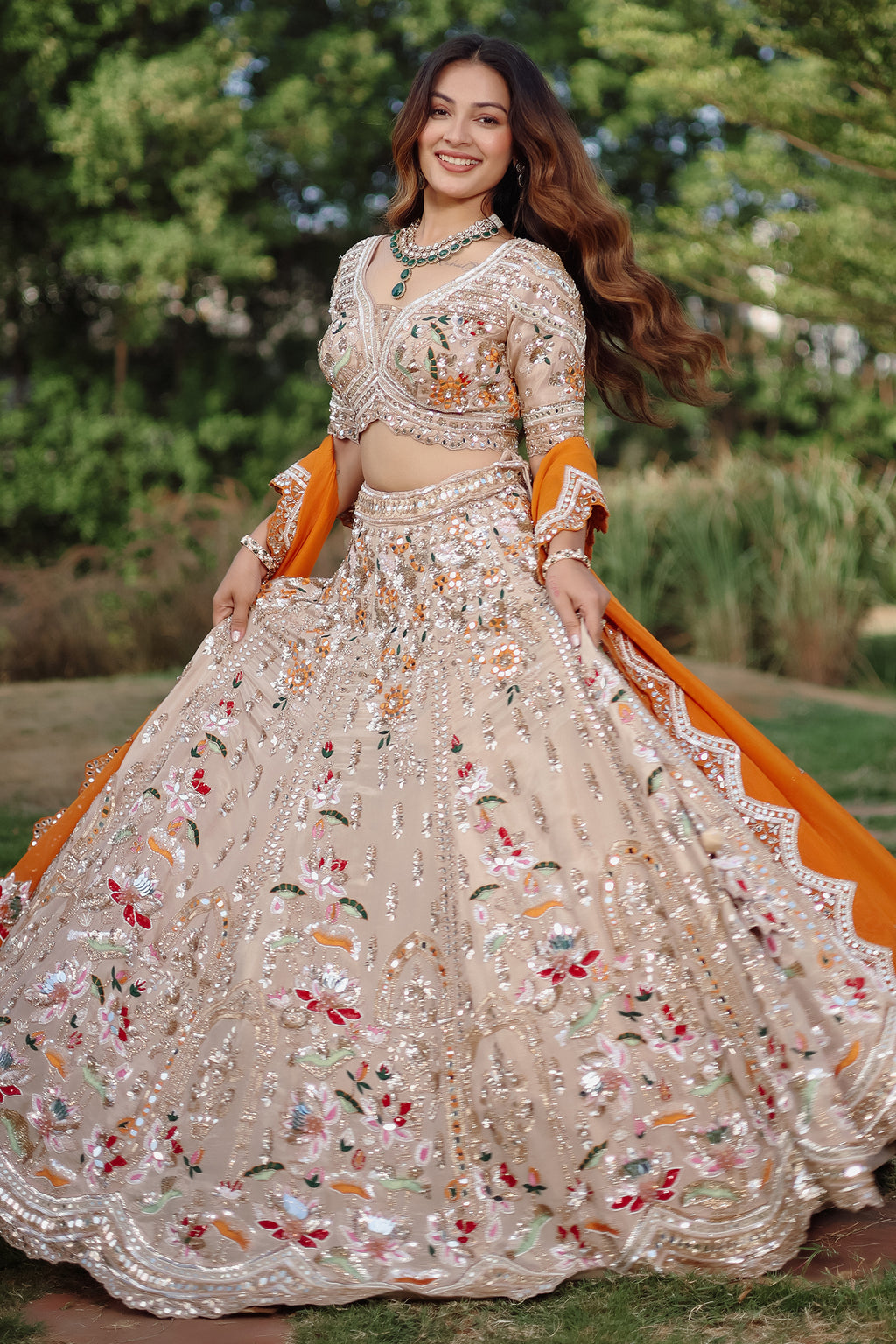 The Beige Gold Tissue Silk Kalidar Lehenga Ensemble with Hand-Embellished V-Shape Blouse and Scalloped Organza Dupatta