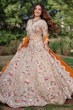 The Beige Gold Tissue Silk Kalidar Lehenga Ensemble with Hand-Embellished V-Shape Blouse and Scalloped Organza Dupatta