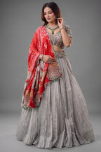 The Imperial Silver Tissue Pleated Lehenga with Coordinated Zardosi Blouse and Handcrafted Gaji Bandhej Patchwork Dupatta
