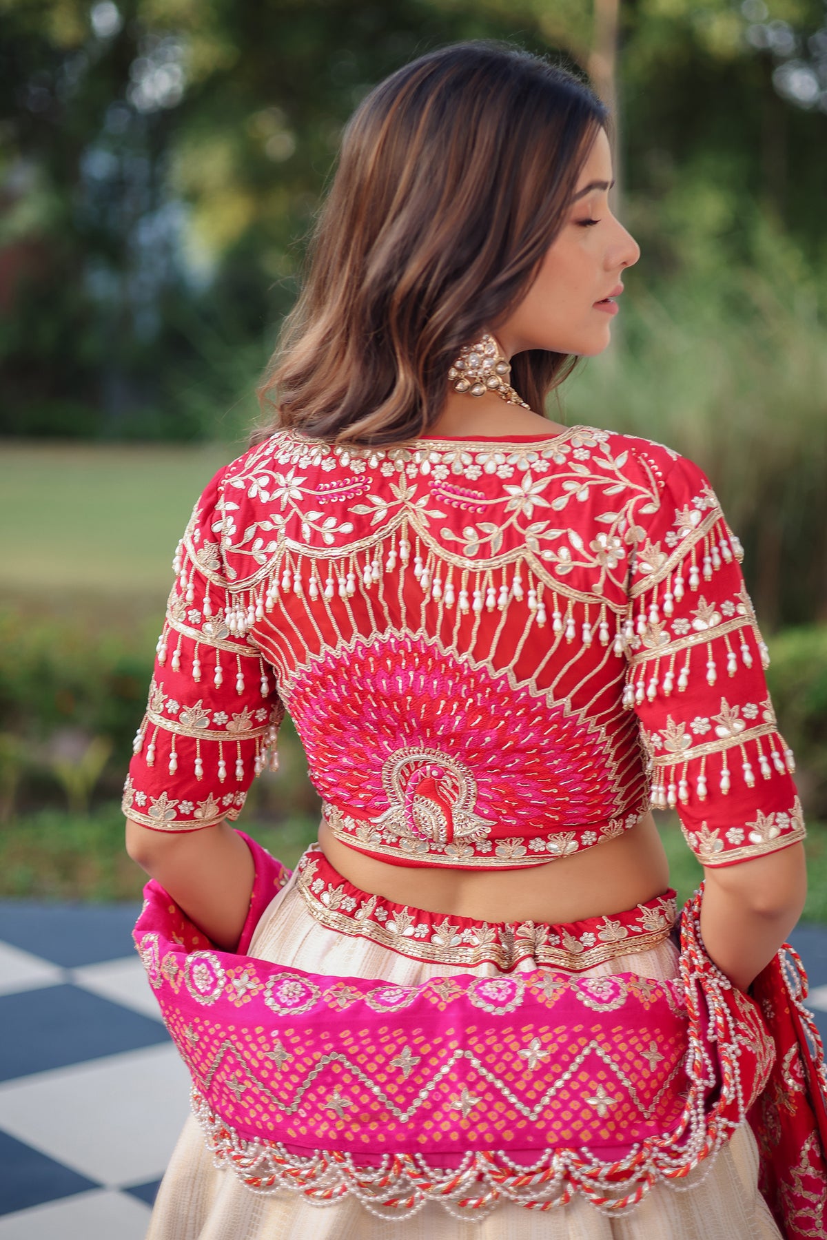 The Cream Silk Paithani Border Lehenga with Peacock Motif Gota Choli and Pink Gaji Bandhej Dupatta