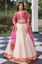 The Cream Silk Paithani Border Lehenga with Peacock Motif Gota Choli and Pink Gaji Bandhej Dupatta