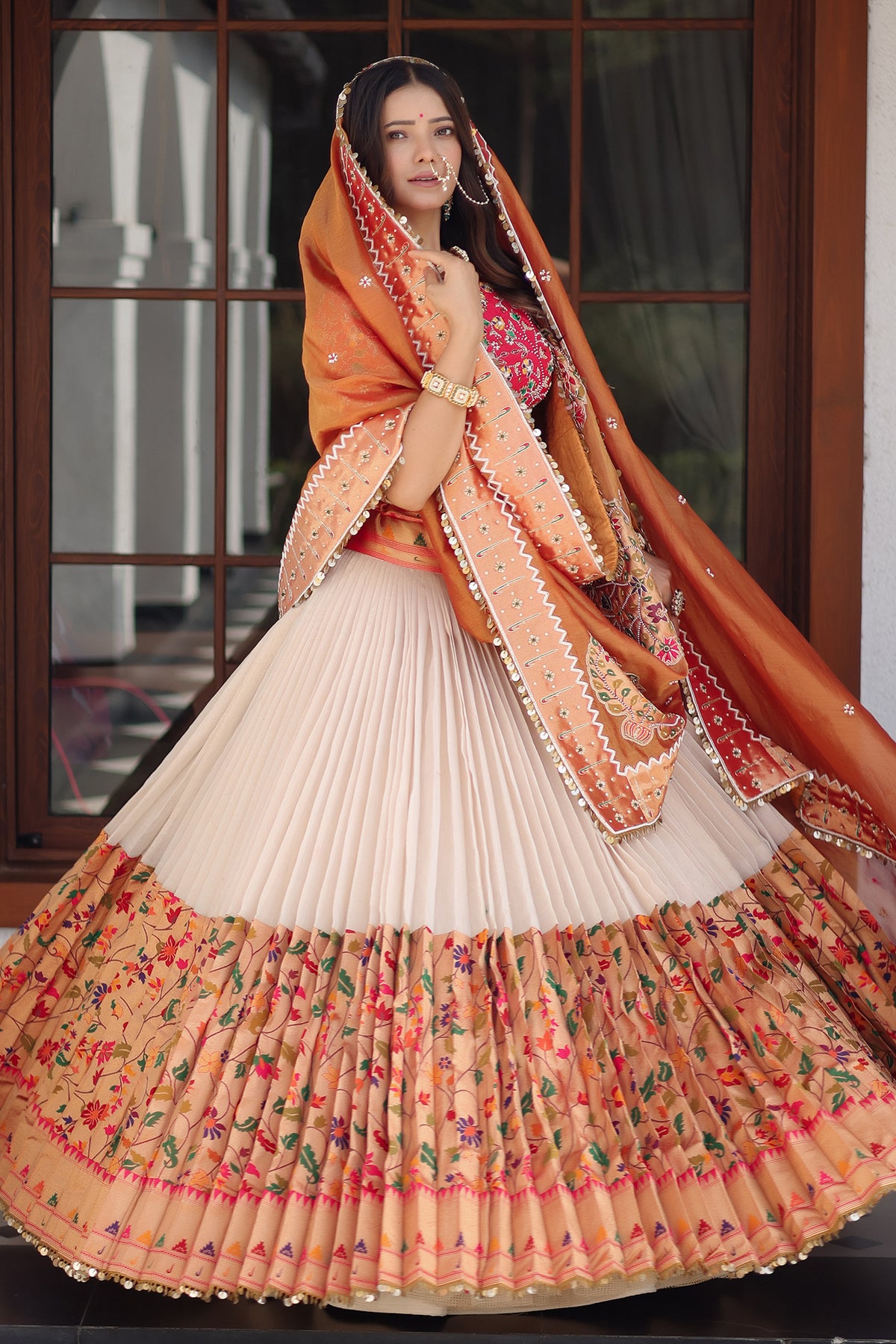 The Cream Silk Pleated Paithani Lehenga Ensemble with Embellished Blouse