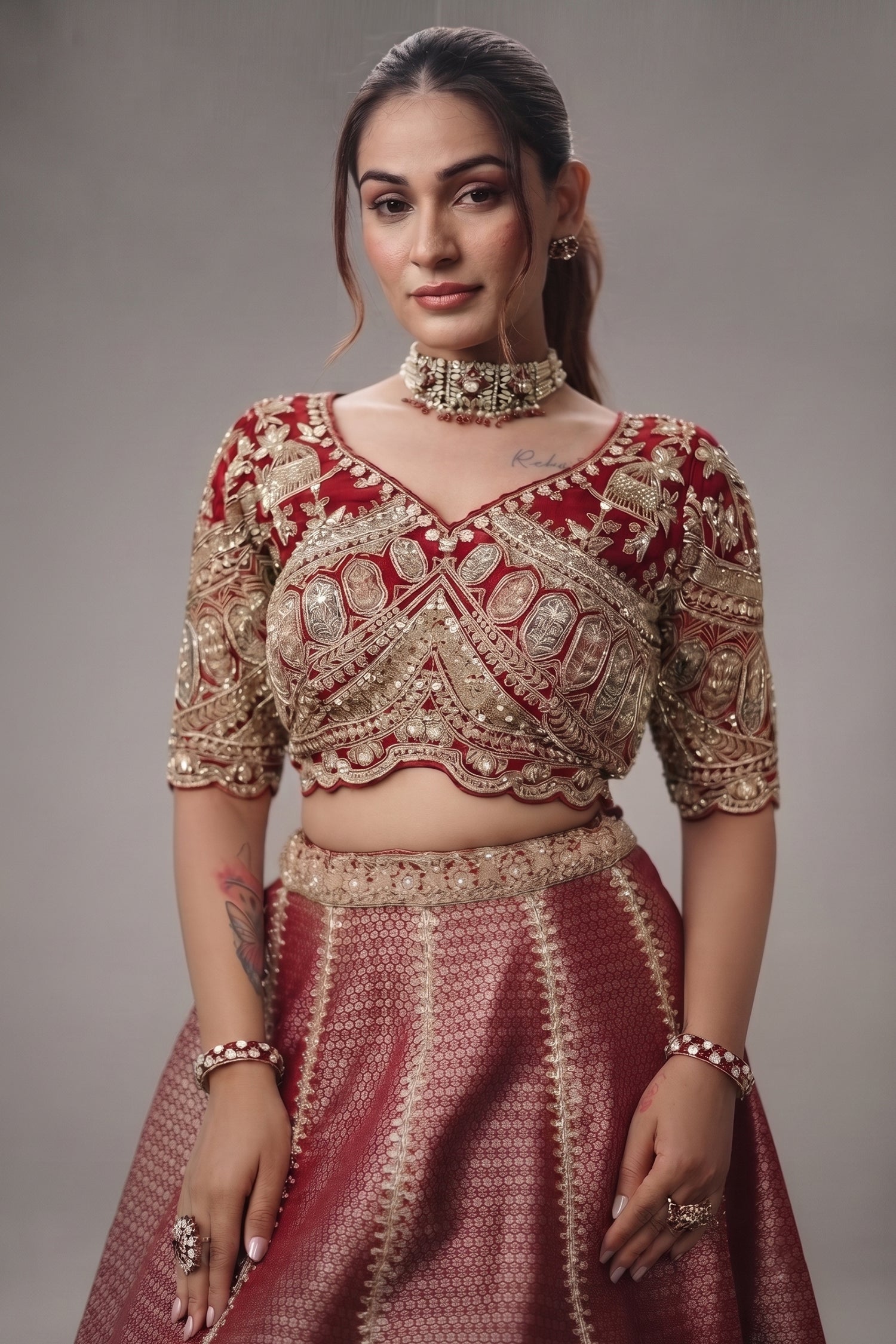 The Majestic Maroon Banarasi Silk Bridal Lehenga Ensemble with Jharokha Zardosi Blouse and Sheer Scalloped Veil Secondary image
