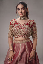 The Majestic Maroon Banarasi Silk Bridal Lehenga Ensemble with Jharokha Zardosi Blouse and Sheer Scalloped Veil